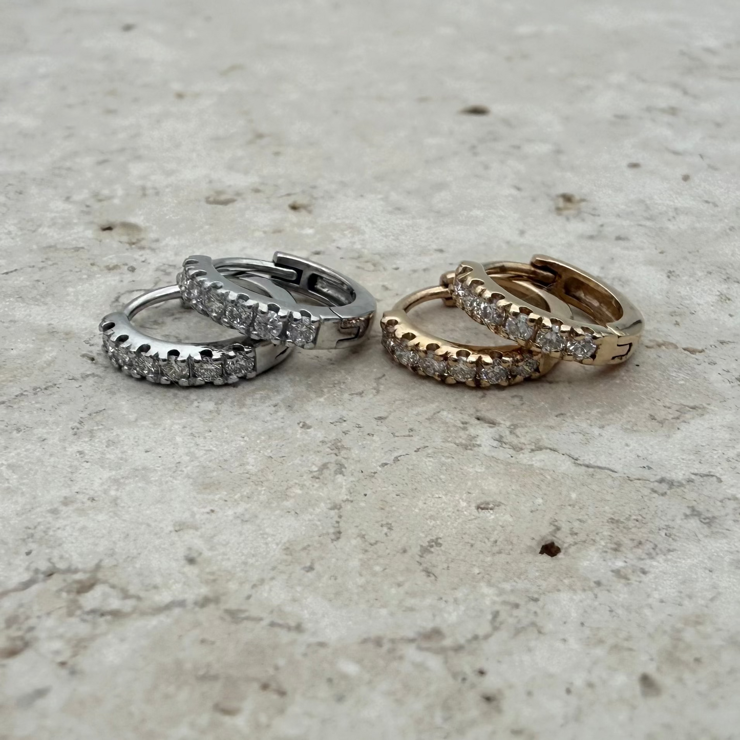 8mm huggie earings with 6 lab diamonds. Shown in white and yellow gold.